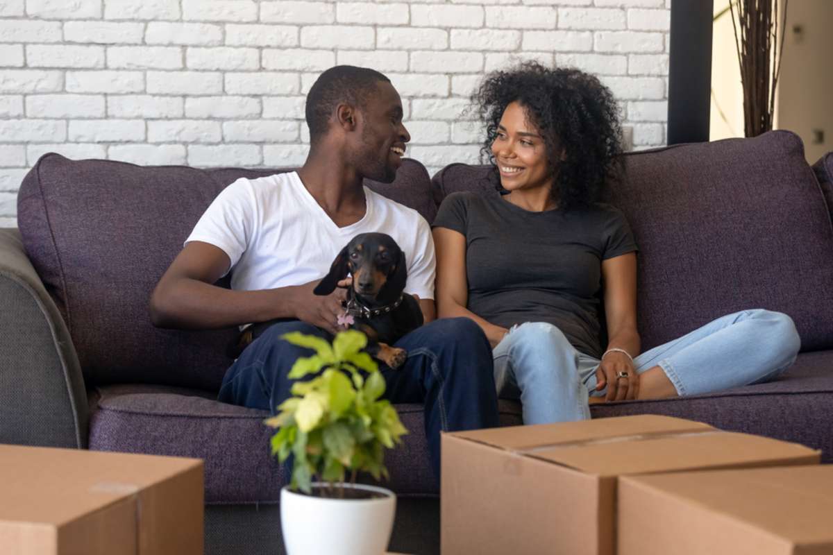 Young african american couple happy to move into new home
