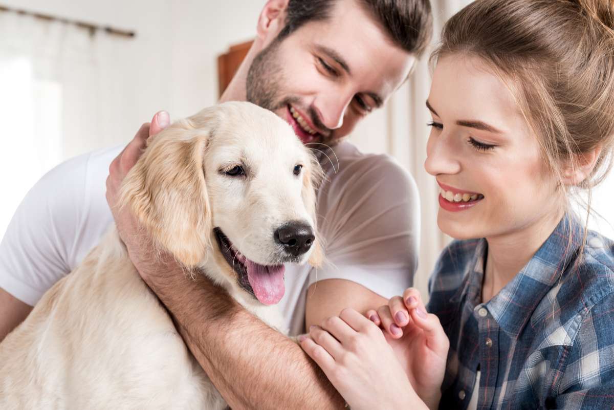 Young couple with puppy (R) (S)